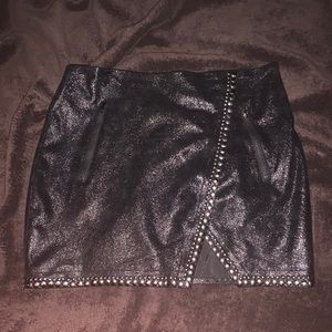 Black studded mini skirt